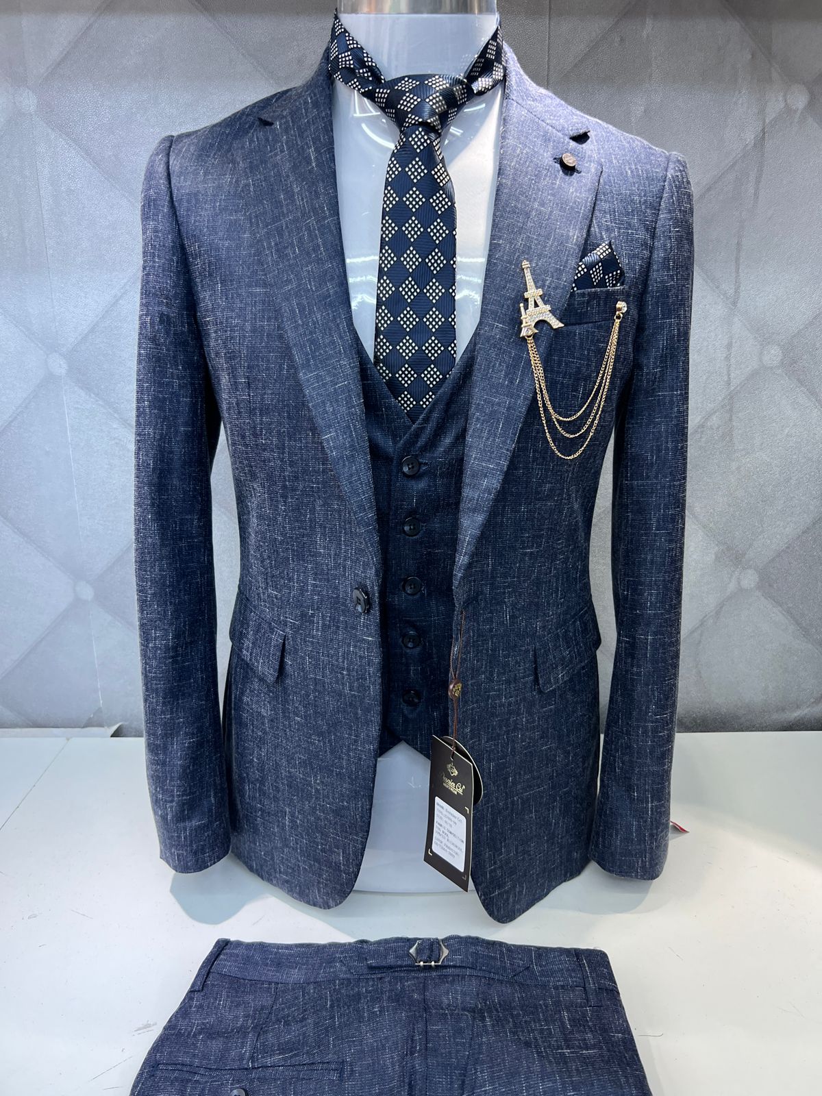 Navy Blue Textured Three-Piece Suit with Eiffel Tower Lapel Chain